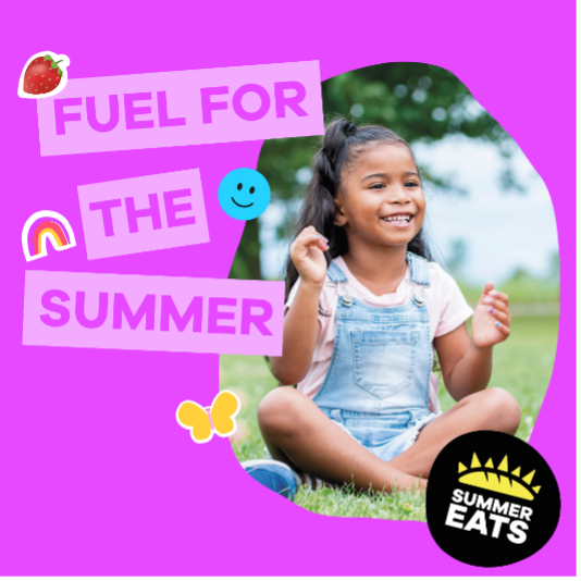 girl sitting on grass with Summer Eats sign.