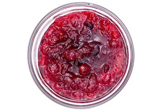 Cranberry wojapi in a glass bowl.