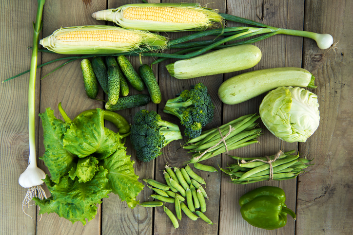 mix of vegetables on a wooden background