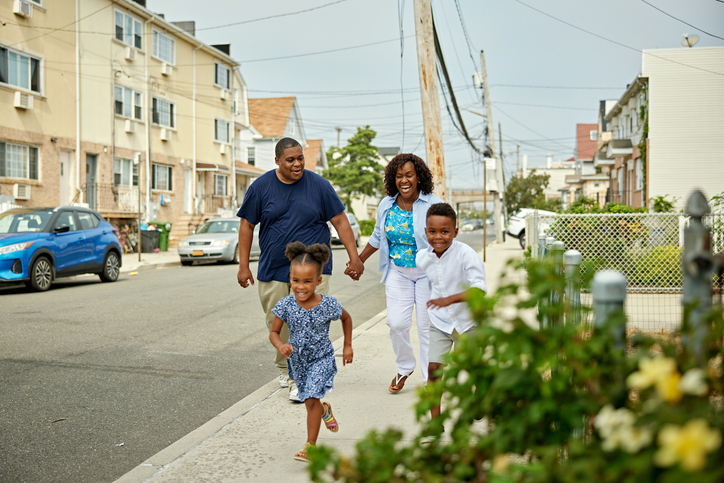 A family walking down the street?