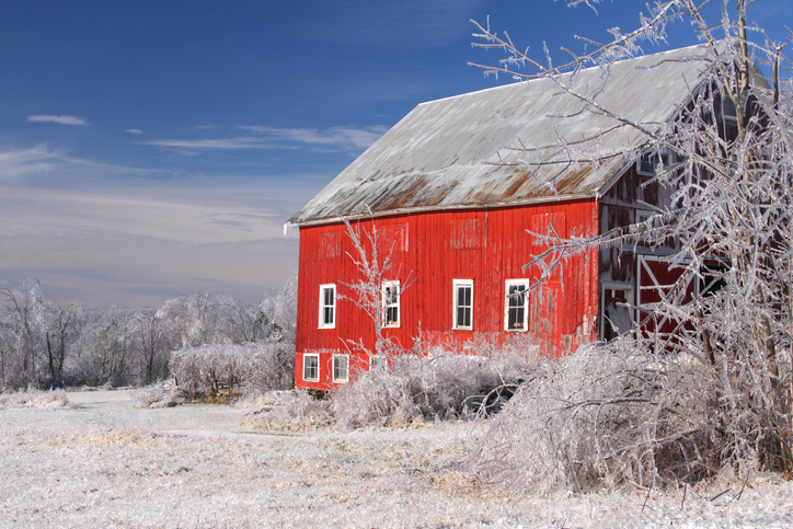 Red Barn covered in thick glaze of Ice