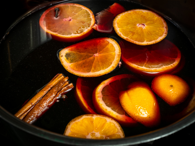 Traditional Swedish Christmas drink, called Glogg, similar to Gluhwein, here being prepared with red wine, oranges and cinnamon.