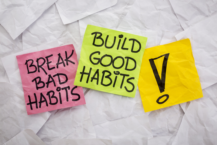 break bad habits, build good habits - motivational reminder on colorful sticky notes - self-development concept